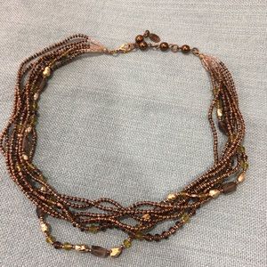 Rachel Reinhardt 14 1/2 to 16 inch gold, brown and green beaded necklace.